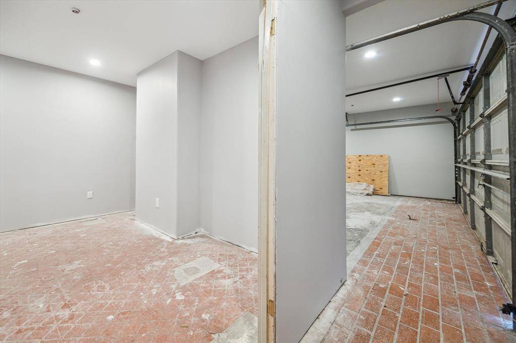 One of the garage bays has a room built in for tools or storage.  Easy to remove if not needed.