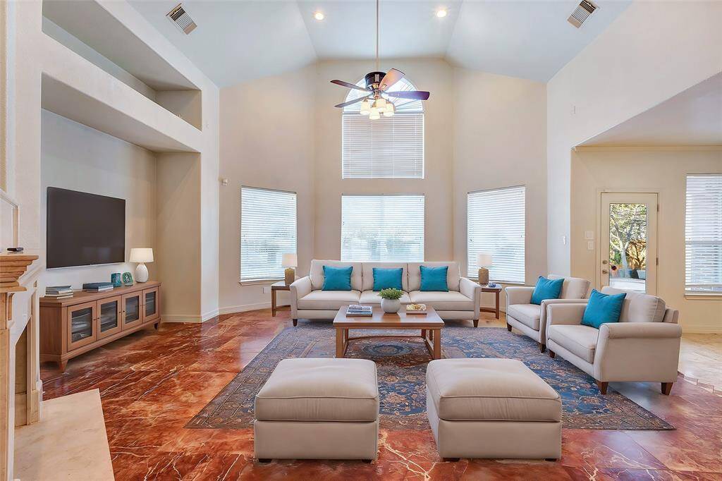 This is a RENDERING of what the Family Room would look like with furniture.