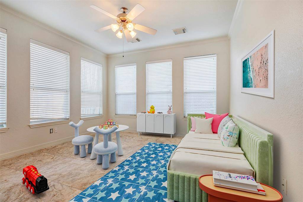 This is a RENDERING of what the Sunroom/Childrens Play room would look like with furniture.