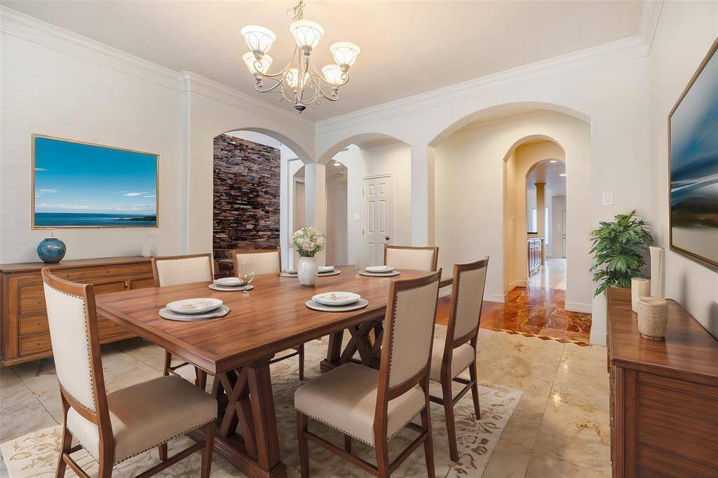 This is a RENDERING of what the Dining Room would look like with furniture.