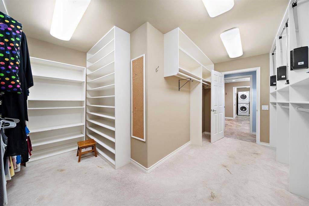 1st Floor Primary Bedroom Walk-In Closet with built-in storage. WOW!