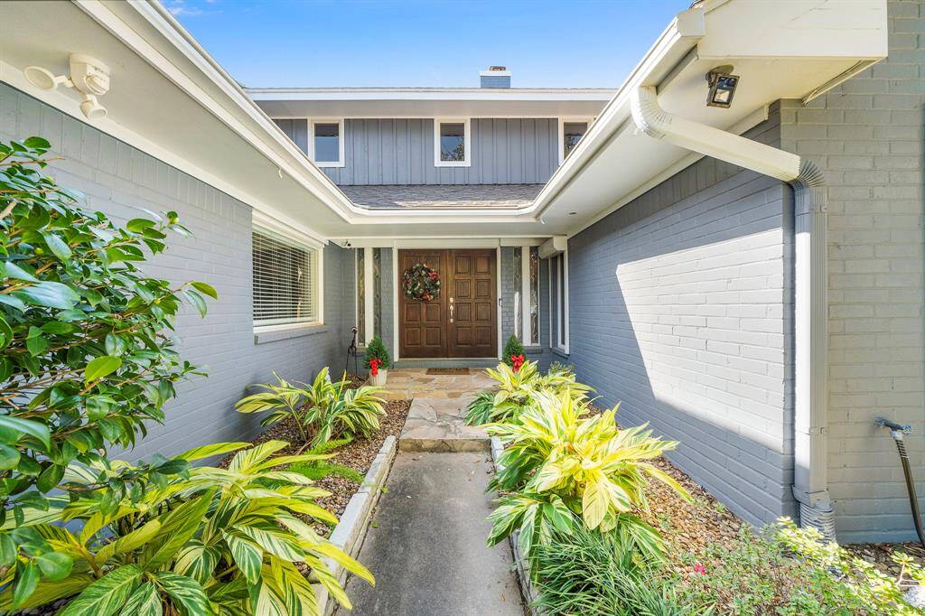 Beautiful entry to the home with Gorgeous Solid Wood Double Doors