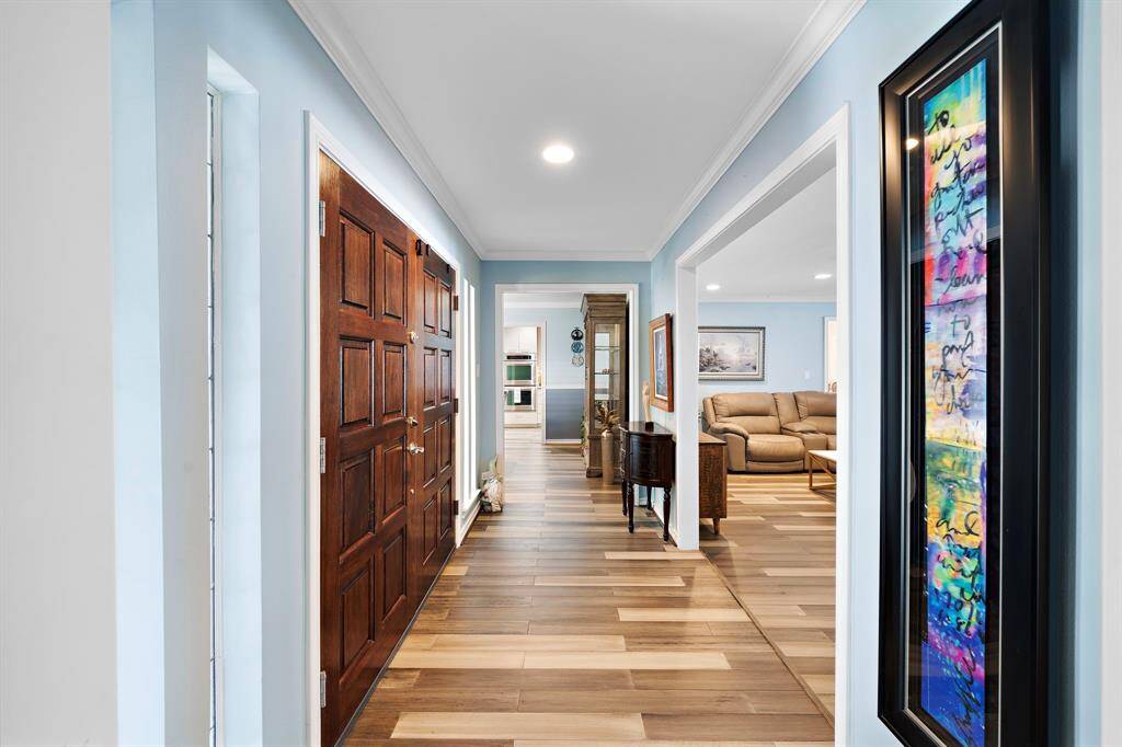 Spacious Foyer leading to dining room with a view straight out to the Lake