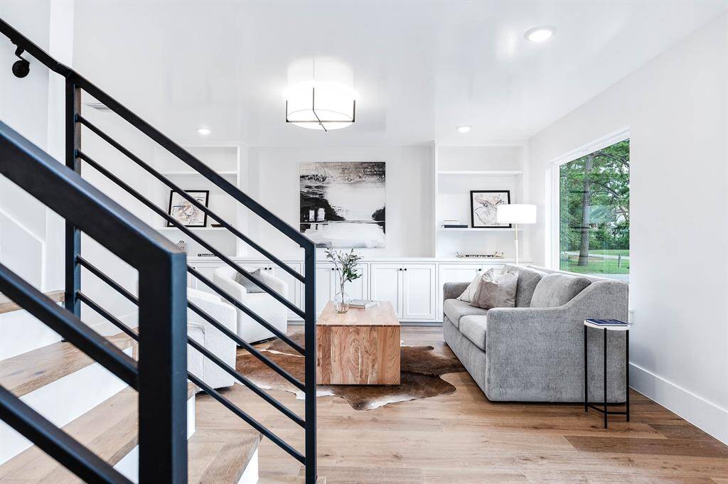 Custom home with sleek and modern aesthetic that maximizes natural lighting