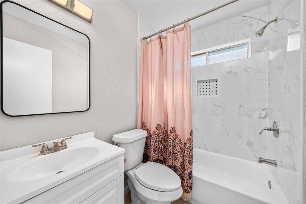 Completely remodeled secondary bathroom.