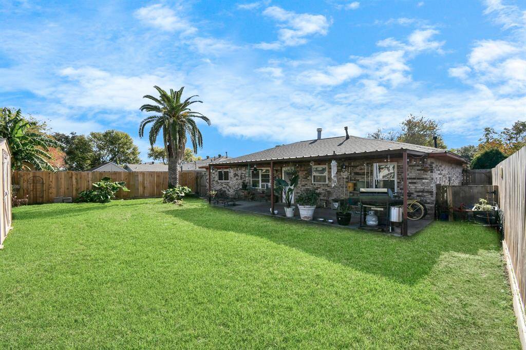 Lush and large backyard space is perfect for entertaining