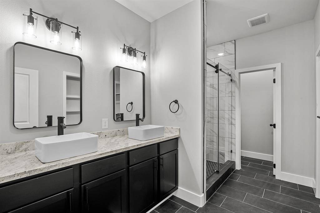Double vanity and stand up shower