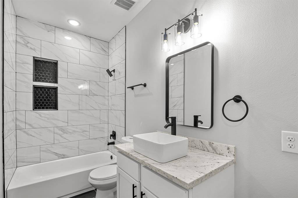Secondary full bathroom located on second floor