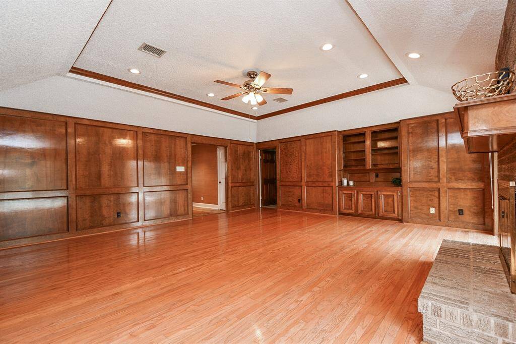 Additional view of family room.  The wood paneling is magnificant in this space.