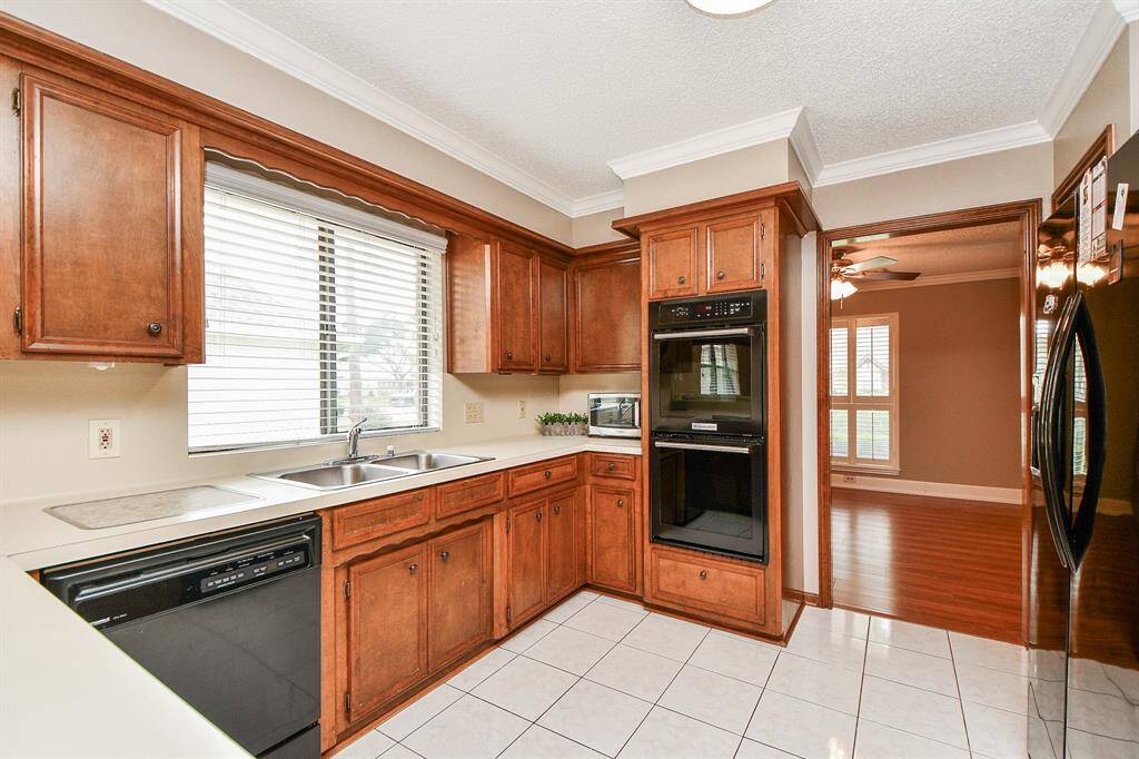 Seamless transition from kitchen to formal dining area.