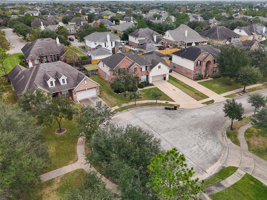 Home is located in a cul-de-sac, notice sidewalks leading to walking trail in the bottom left hand corner of the photo