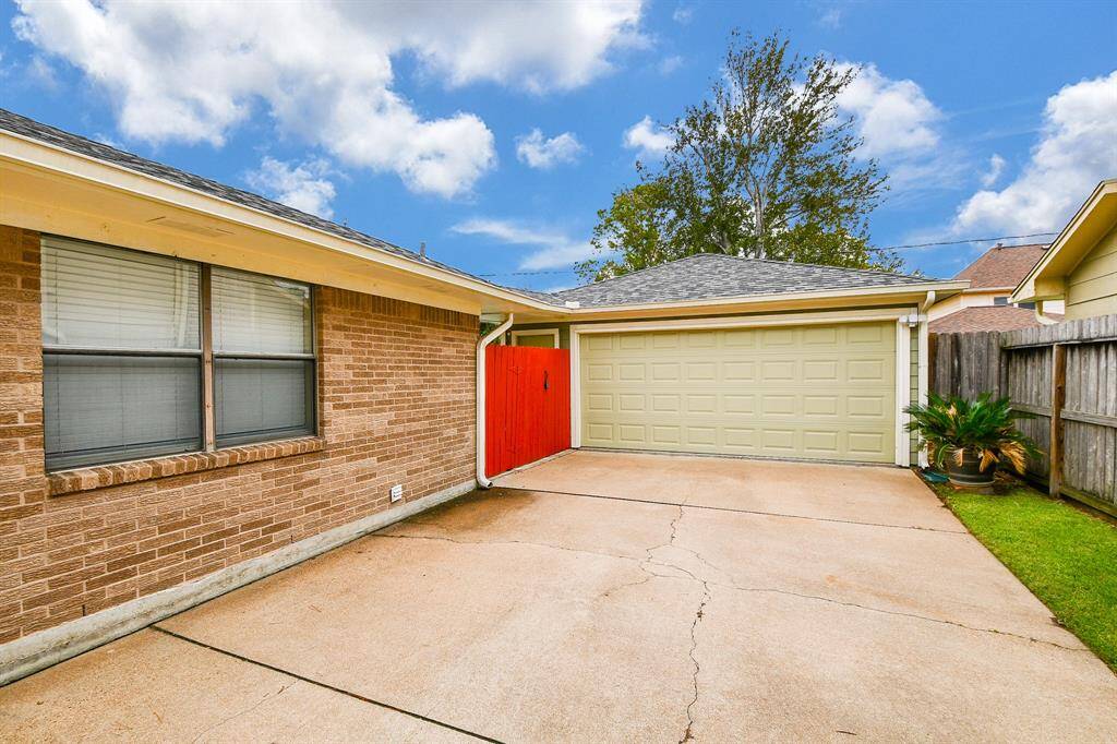 Spacious detached garage for two cars.