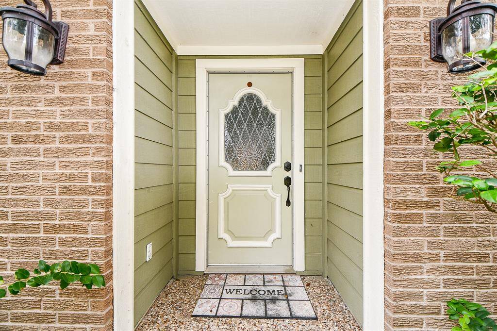 Welcoming front entry with charming details and a cozy ambiance.