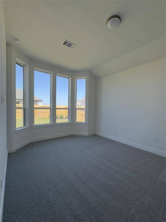 HOME IN PROGRESS - Spacious primary bedroom featuring a beautiful bay window that fills the room with natural light!