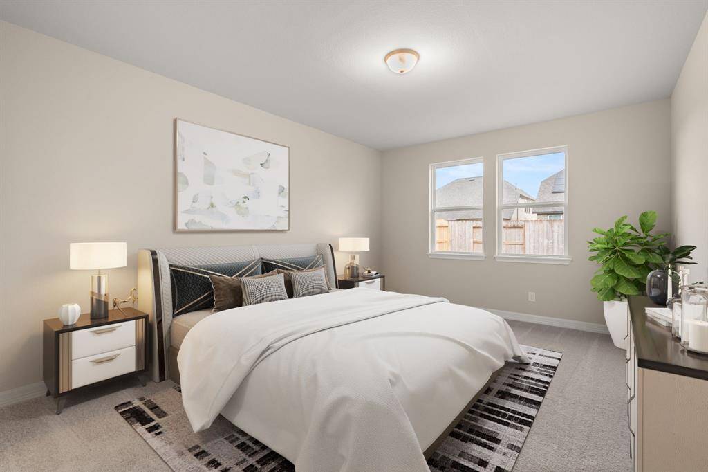 The primary bedroom is generously sized, creating a tranquil and spacious retreat that offers ample room for relaxation. Featuring plush carpet, high ceilings, fresh paint, and large windows that lets in natural lighting throughout the day. Photo is virtually staged