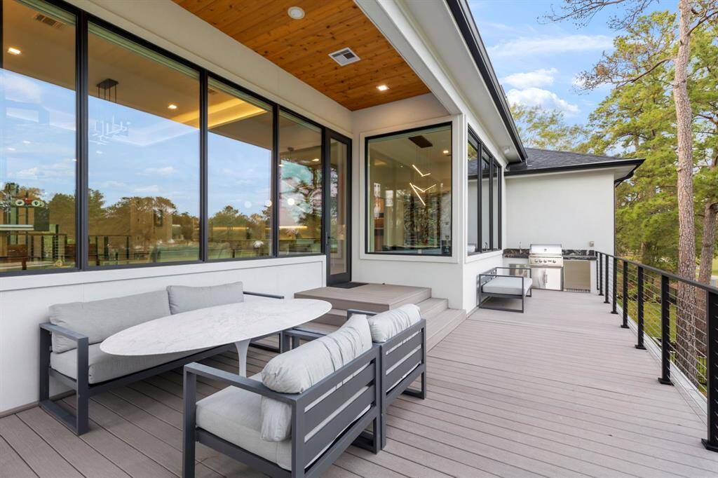 View of the upper deck with a view of the summer kitchen.