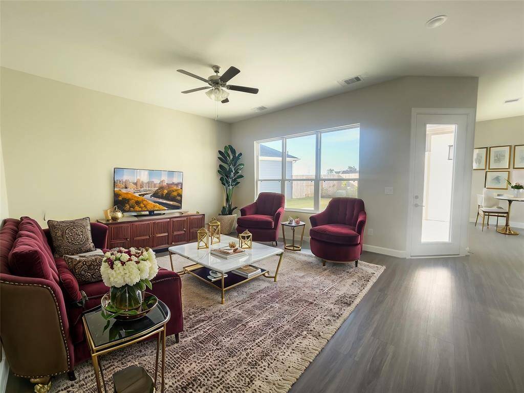 This living Space Features and expansive, light filled area with large windows and a versatile layount perfect for entertaining and everyday living. *Image depicted is similar to the same floor plan in the community and is virtually staged.