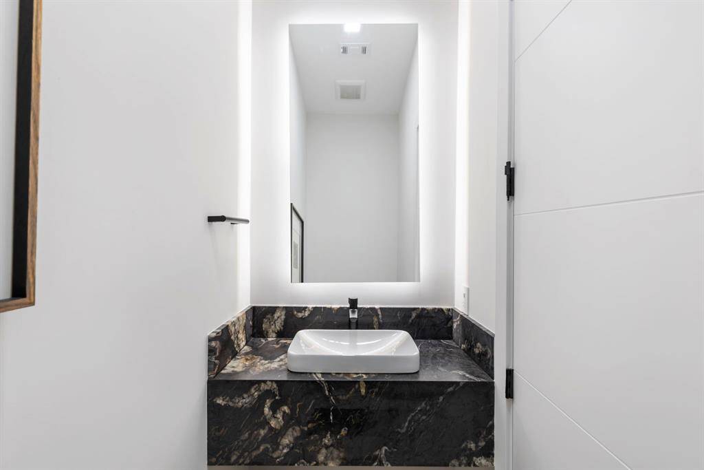 The 1/2 bathroom next to the family/gameroom was an addition by the seller.