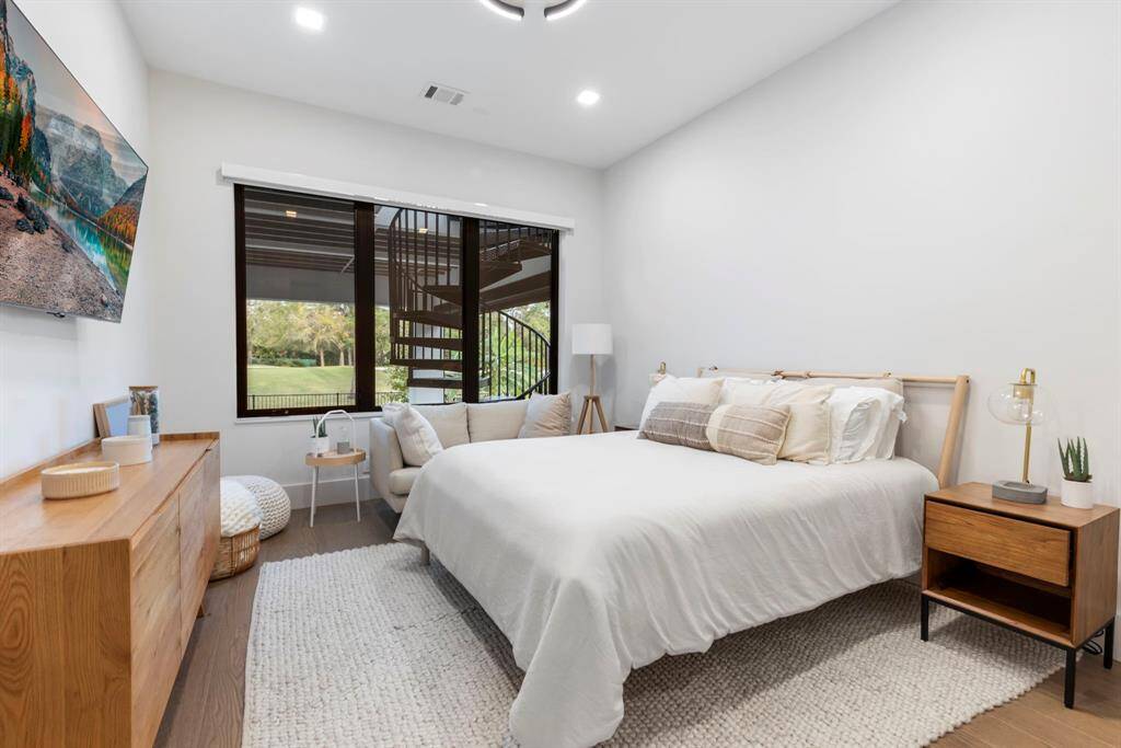 Bedroom 3 is located downstairs, next to the family/gameroom room with views of the golf course.