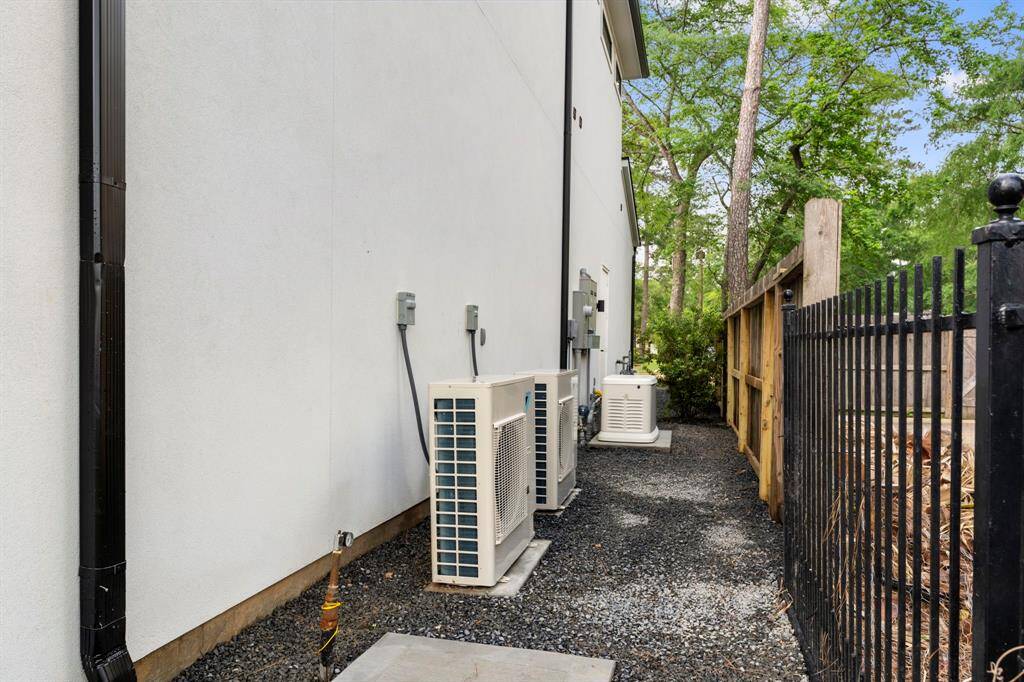 View of the Daikin AC equipment and whole home 24KW Generac Generator.