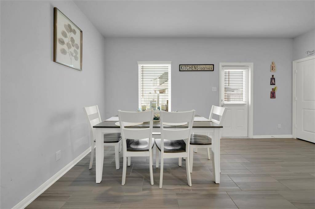 Spacious kitchen featuring an island and a convenient walk-in pantry.