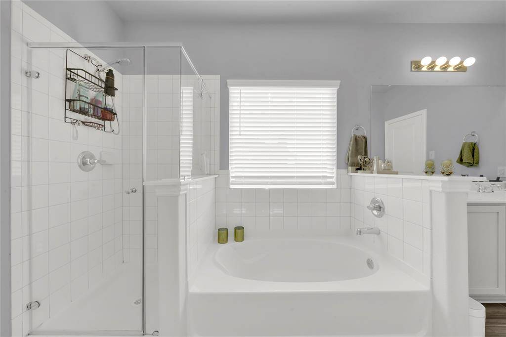Large primary suite offering comfort and elegance.