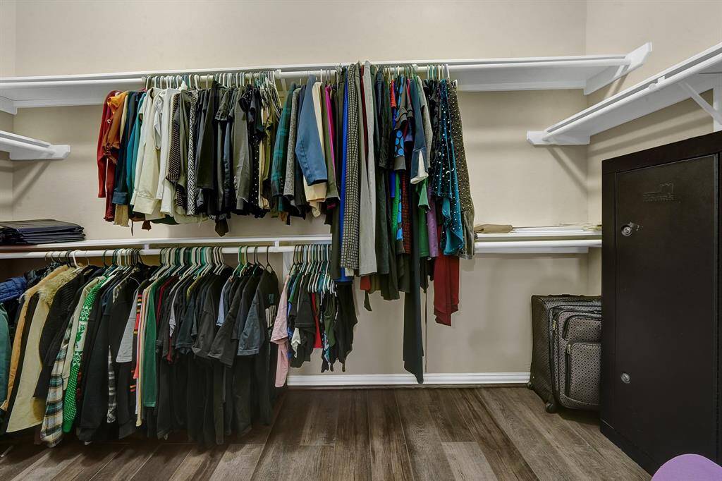Extra large walk in closet in Primary room.