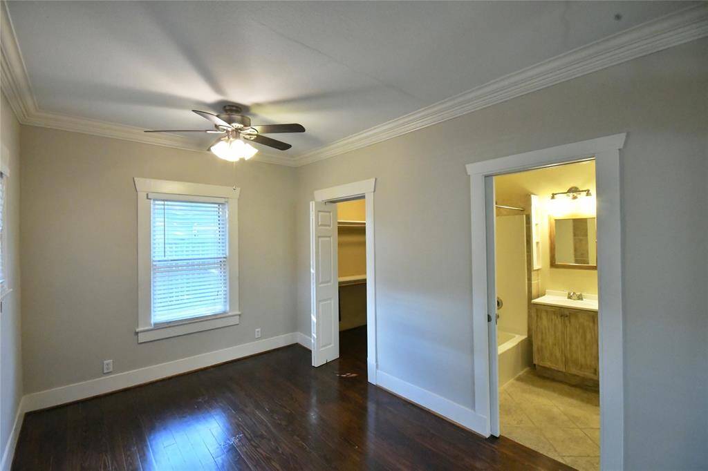 Second bedroom adjoining the kitchen with walk in closet and full bath.