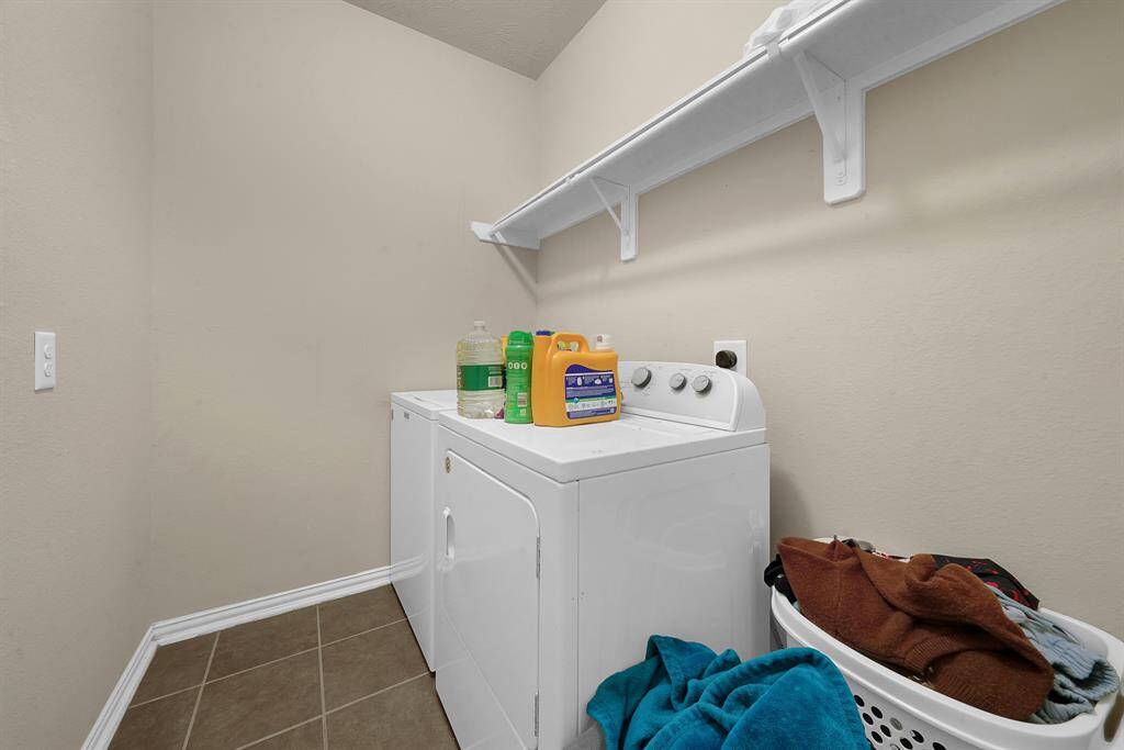Laundry area located on the first floor.
