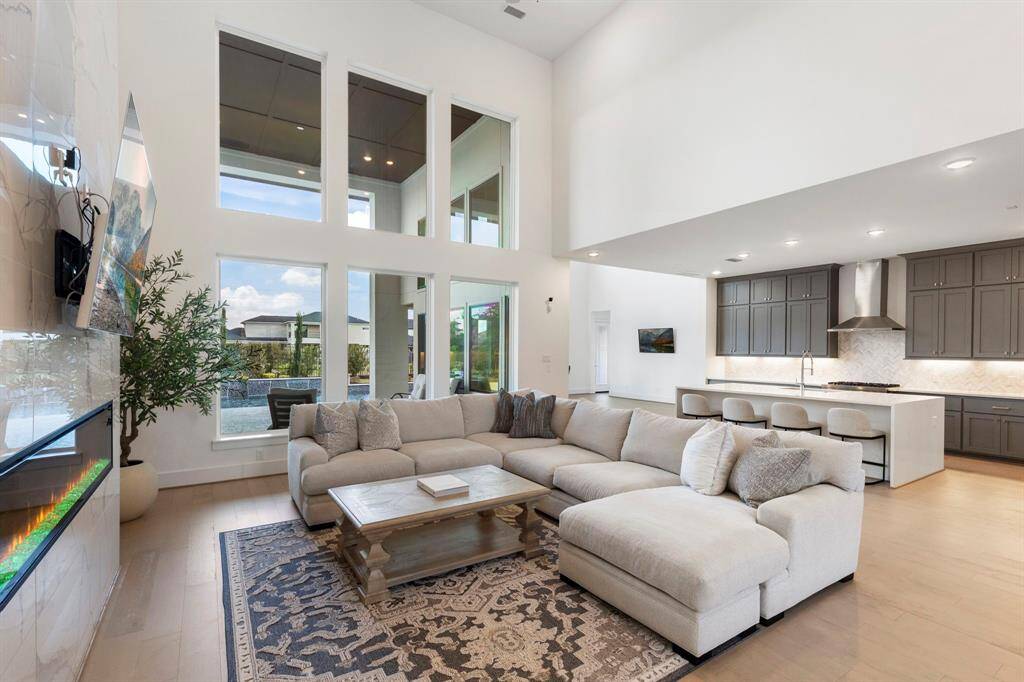 The  large living area is the perfect space to unwind or enjoying family and friends.
