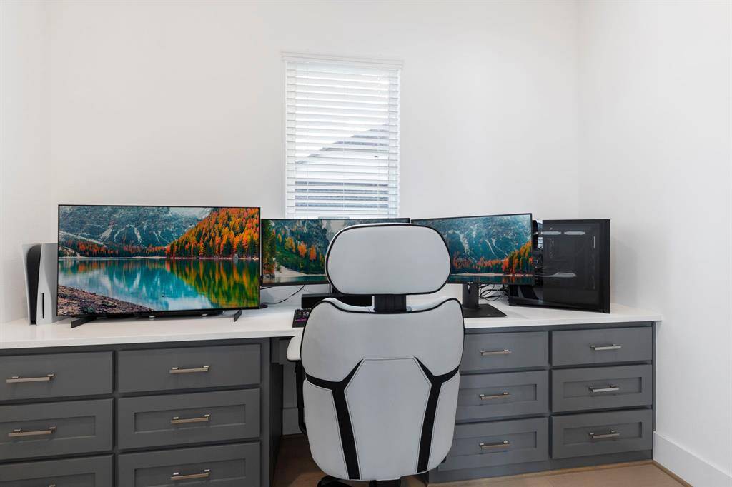 First floor planning station off of the flex space allows for organization and extra storage.