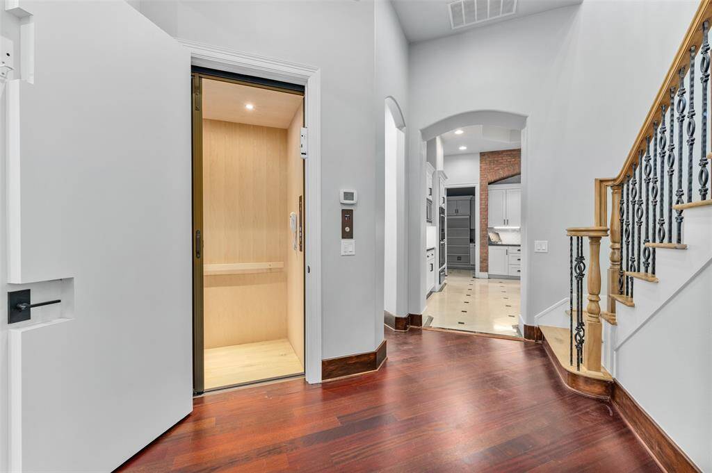 The home is equipped with a convenient elevator, providing easy access to all levels and enhancing the overall comfort and accessibility of the space.