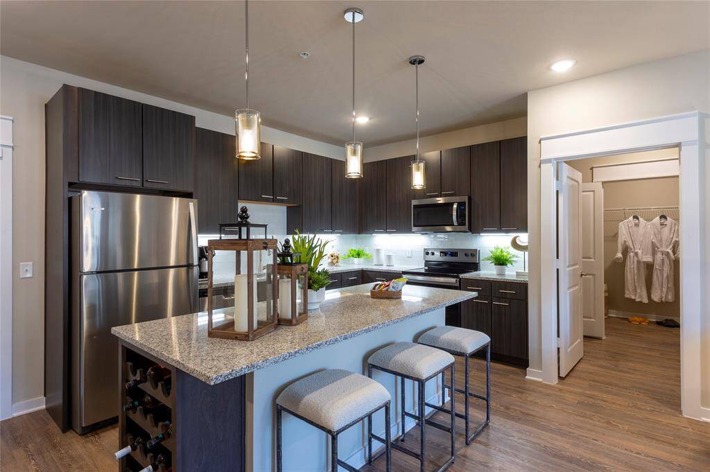 Kitchen -this is the furnished model, not actual unit, photo is for reference only