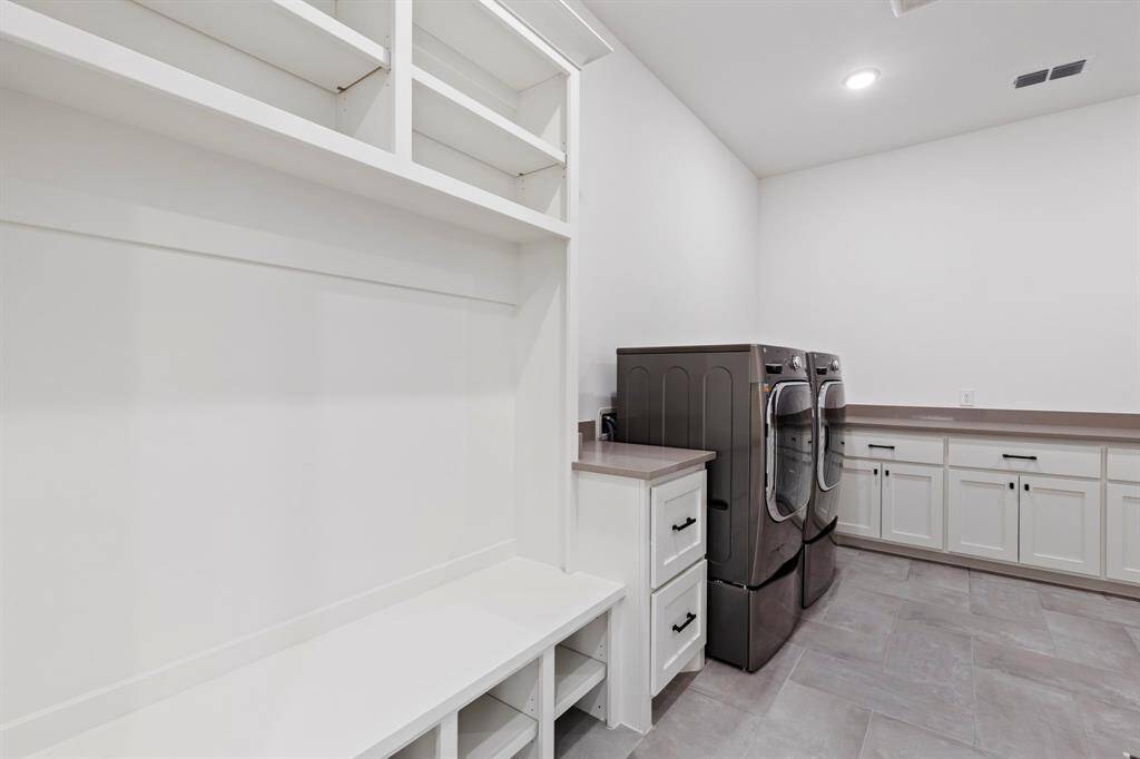Utility room with mud drop off.