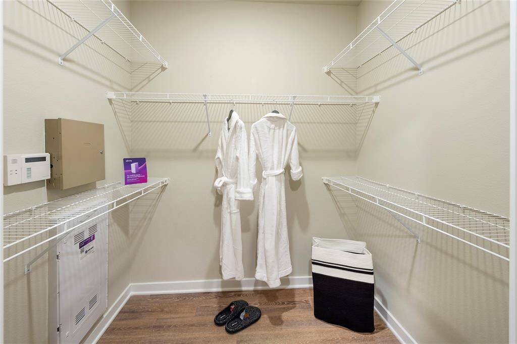 Walk-in closet -this is the furnished model, not actual unit, photo is for reference only