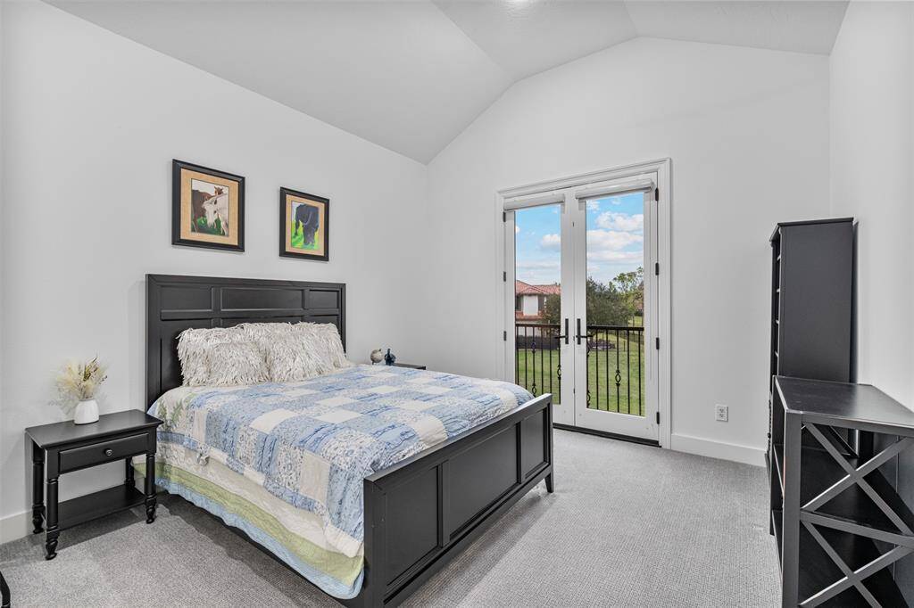 Total of 6 bedrooms: spacious bedroom features elegant finishes and ample natural light, creating a comfortable and inviting retreat for relaxation and rest. This bedroom has a balcony doors for a great view.