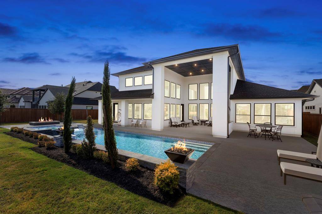 With no back neighbors this private heated PebbleTec pool is the perfect place to unwind.