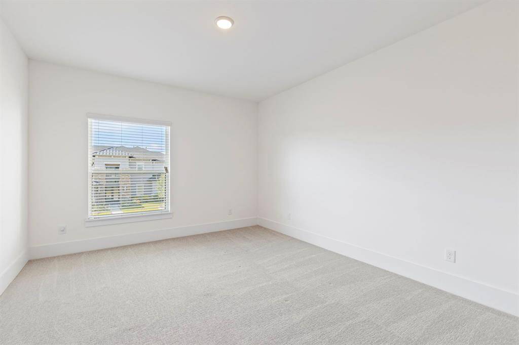 Secondary second story bedroom with ensuite.
