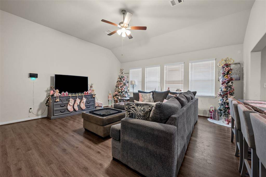 Living room featuring expansive window wall.