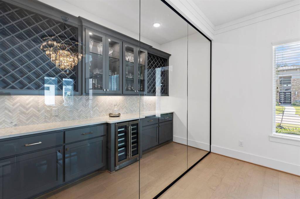 Stunning addition, with this custom wine room.