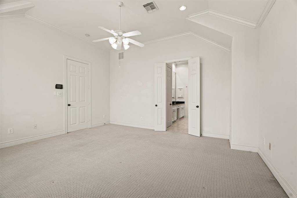 Primary bath with double sinks and walk-in shower