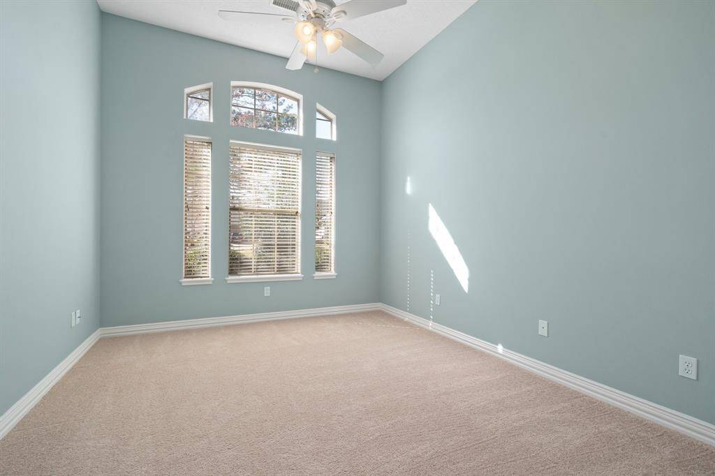 2nd bedroom in the front of the house, freshly painted with steam cleaned carpets, in all three bedrooms.