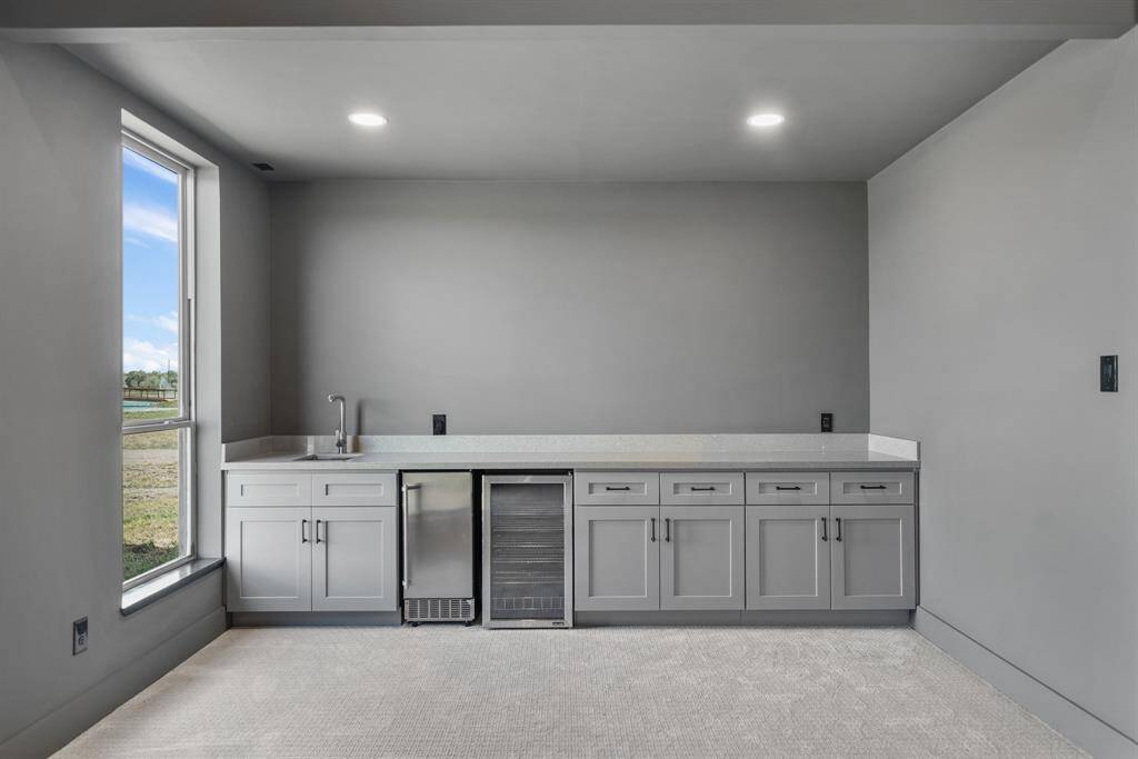 Wet bar perfect for entertaining.