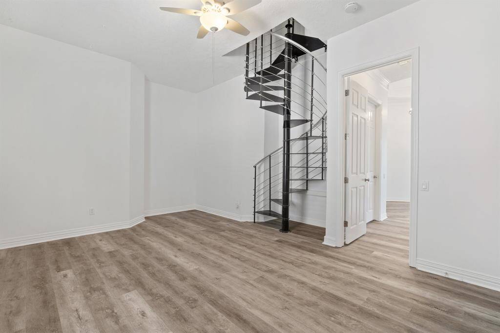 Game room off of the garage with new spiral staircase to the extra living space recently added for a nice private office or study above.