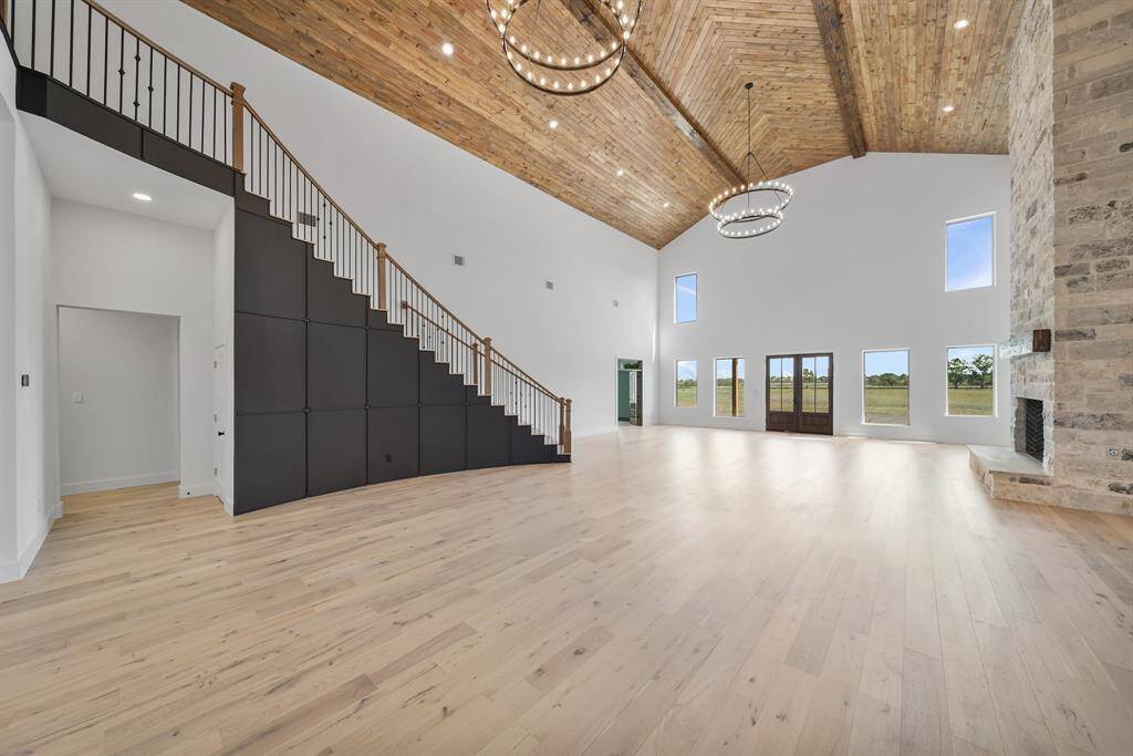 A sleek staircase adds a modern touch, perfect for this home.
