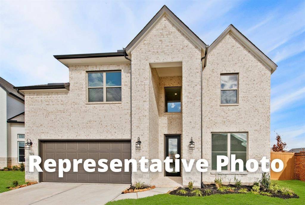 MOVE IN READY!! Westin Homes NEW Construction (Albany IX, Elevation K) Two story. 4 bedrooms. 3.5 baths. Green grass added to enhance photo.