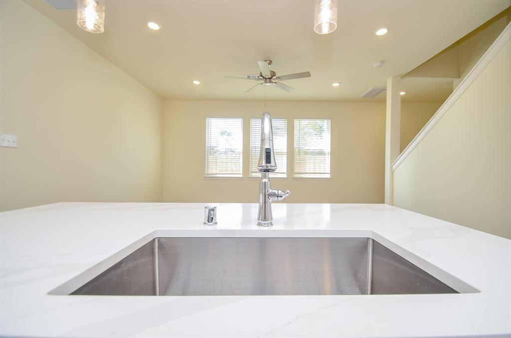 The stainless steel appliances provide a professional touch.