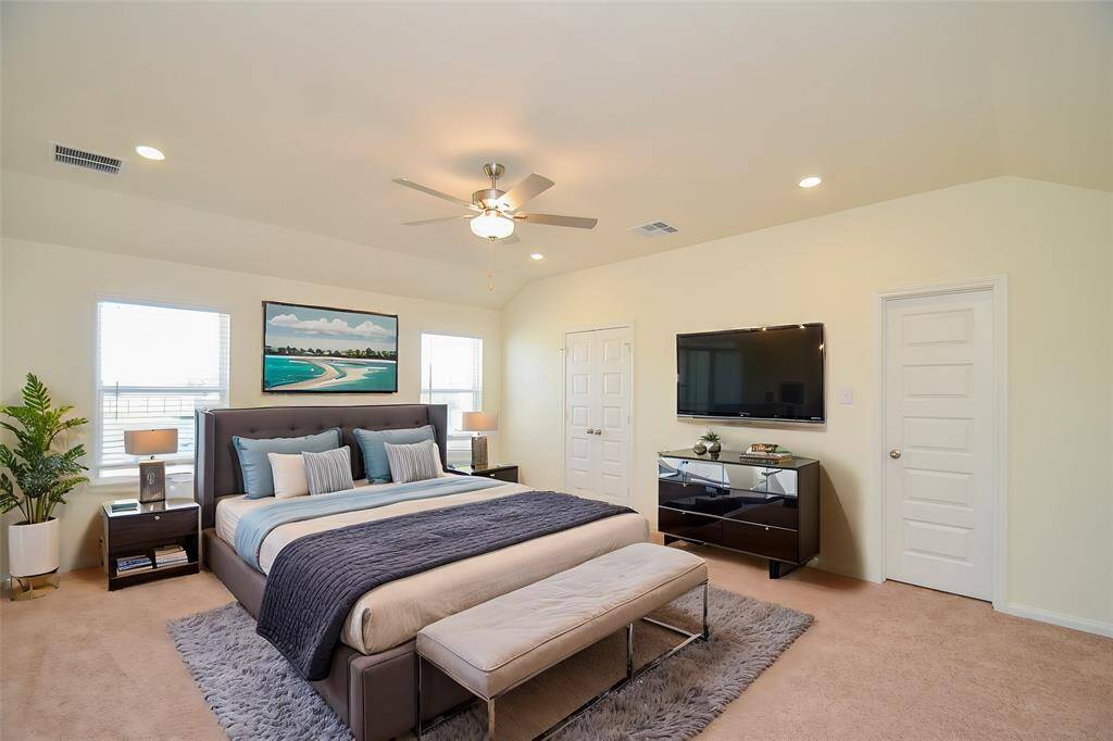 The high vaulted ceiling adds a sense of grandeur and spaciousness.