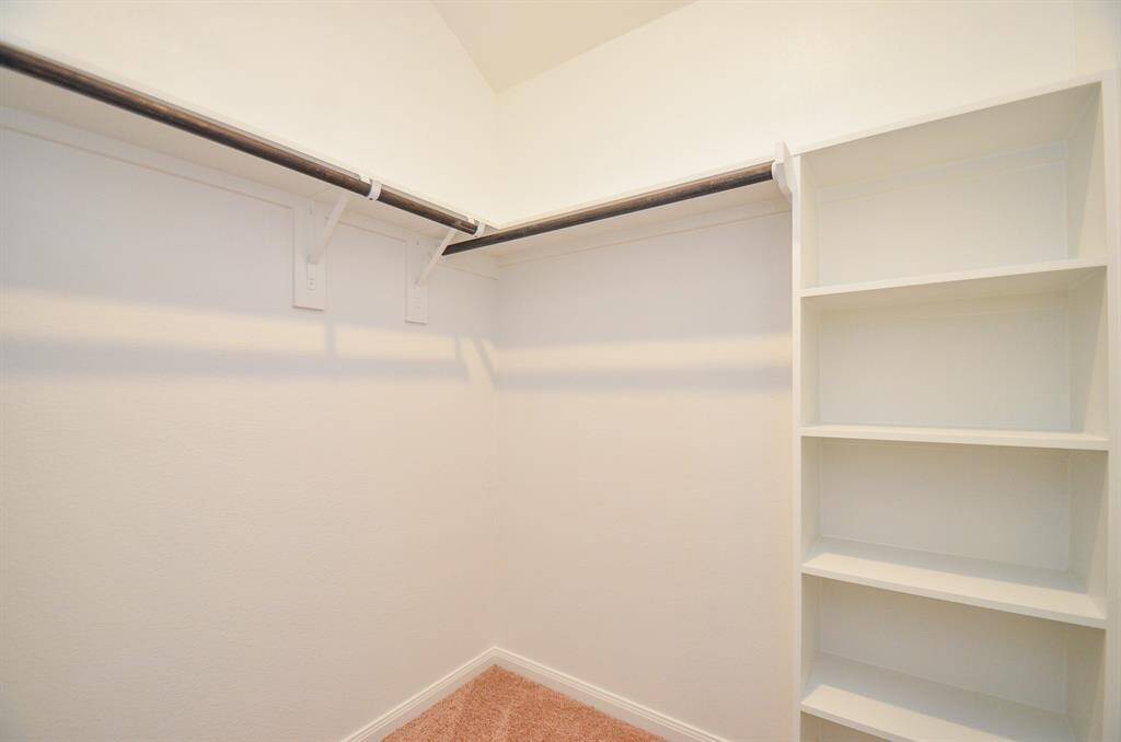 Notice a spacious closet with ample storage, perfect for all your necessities.