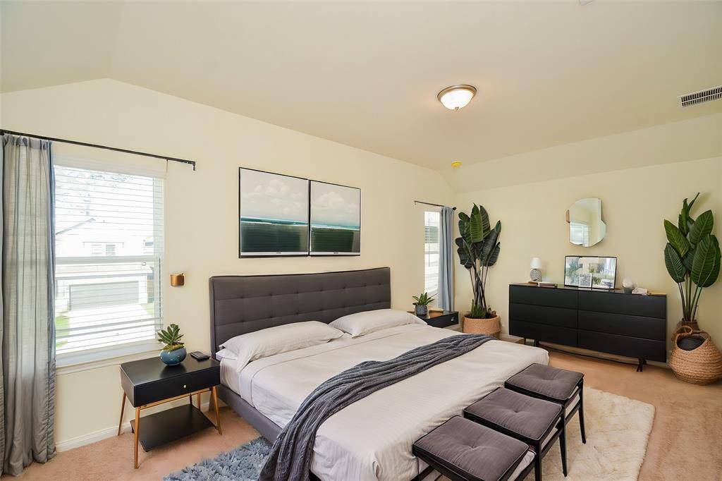 This room's layout provides ample space for a variety of configurations, allowing for flexibility in design.